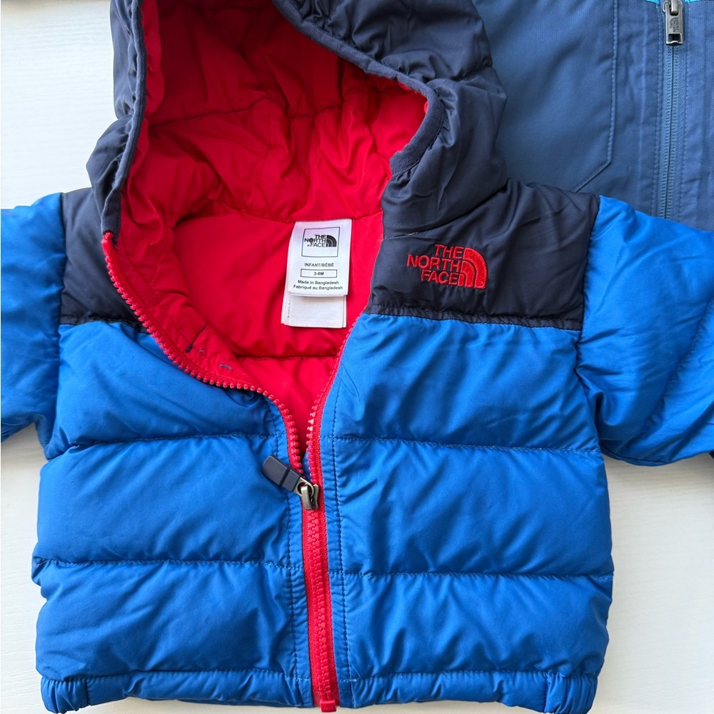 The North Face Bright Blue Puffer Jacket with Red Lining
